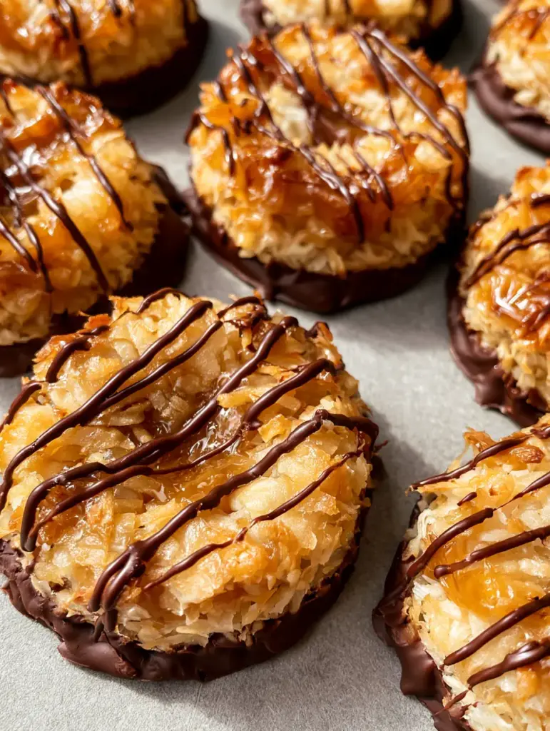 No-Bake Samoa Cookies: The Ultimate Easy Homemade Copycat Recipe 1 Close up of the glossy dark chocolate drizzle on ring-shaped No-Bake Samoa Cookies.