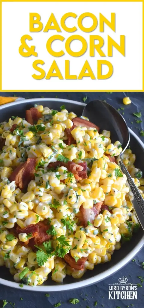 A tall Pinterest pin showing a warm Bacon and Corn Salad in a grey stoneware bowl with glossy dressing and green scallions.