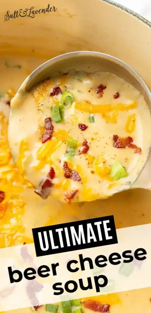 A tall Pinterest pin showing a thick Beer Cheese Soup Recipe topped with bacon and jalapeños in a dark bowl.