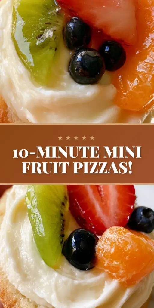 A close-up shot of several Mini Fruit Pizzas on a white marble surface, featuring golden sugar cookies, white cream cheese swirls, and vibrant kiwi, strawberry, and blueberries.