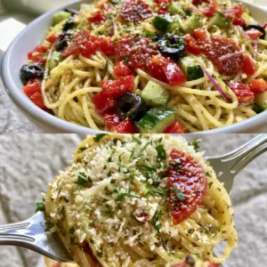Top view of a large white bowl filled with glossy Spaghetti Salad featuring red onion slivers and black olives.
