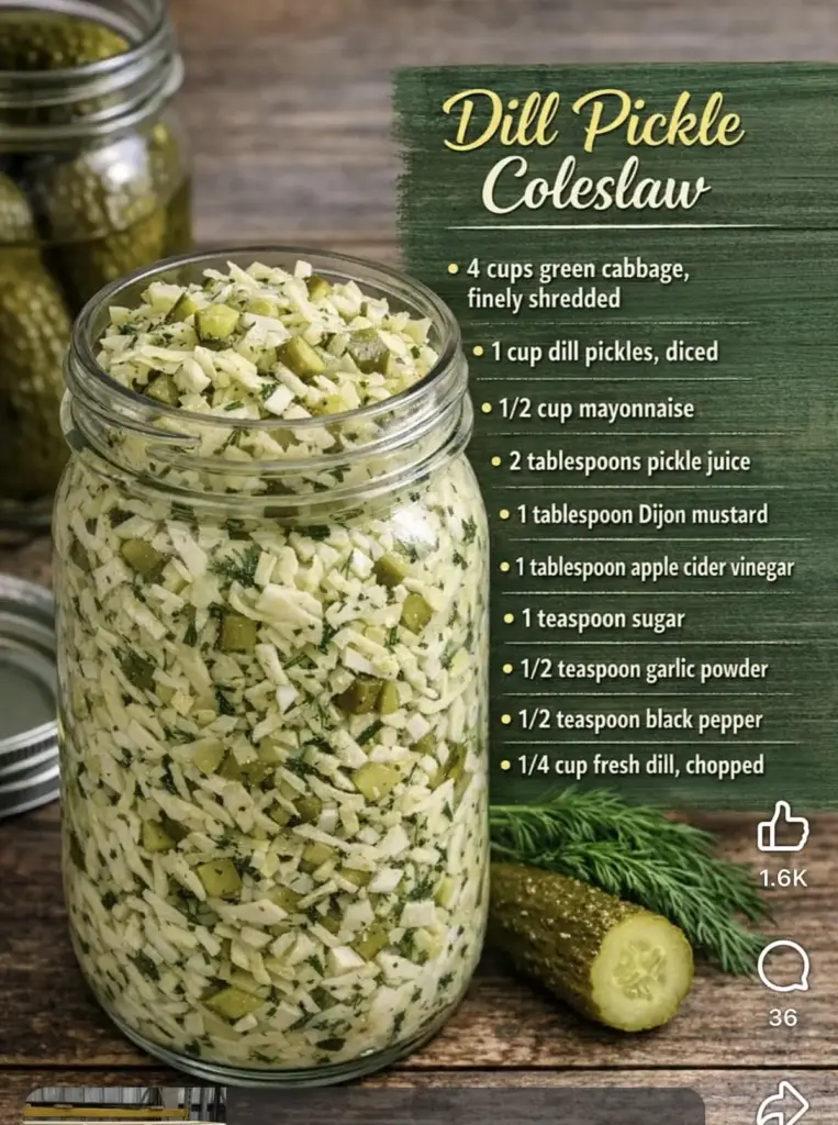 Dill Pickle Coleslaw: The Ultimate Tangy and Creamy Side Dish 4 A top-down view of creamy dill pickle coleslaw in a white bowl showing large chunks of pickles and fresh dill garnish. (dill pickle coleslaw)