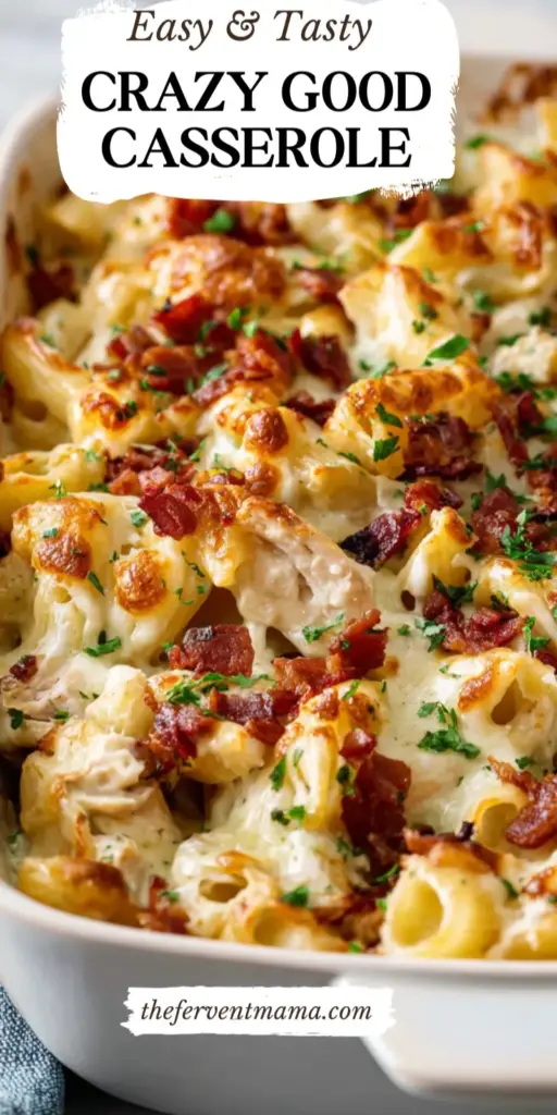 A close-up shot of a Chicken Pasta Casserole in a white ceramic dish with melted bubbly golden cheese and fresh parsley garnish.